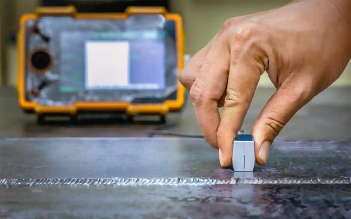 analyzing-weld-on-steel-girder analyzing weld on heavy steel plate